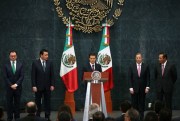 Mexican President Enrique Pena Nieto, center, and former Finance Minister Luis Videgaray, far left, during a swearing-in ceremony at the presidential residence in Mexico City, Sept. 7, 2016 (AP photo by Dario Lopez-Mills).