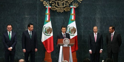 Mexican President Enrique Pena Nieto, center, and former Finance Minister Luis Videgaray, far left, during a swearing-in ceremony at the presidential residence in Mexico City, Sept. 7, 2016 (AP photo by Dario Lopez-Mills).