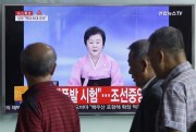 A TV screen showing a North Korean newscaster reading a statement from the North's Nuclear Weapons Institute the at Seoul Railway Station, South Korea, Sept. 9, 2016 (AP photo by Ahn Young-joon).
