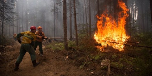 Firefighters take on a wildfire near Turka in Siberia, Russia, Aug. 28, 2015 (AP photo by Anna Ogorodnik).