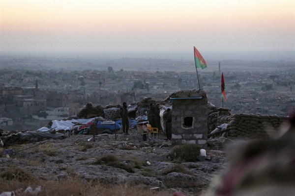 Kurdish fighters preparing to retake Sinjar from the Islamic State, Iraq, Nov. 13, 2015 (AP photo by Bram Janssen).