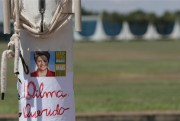 A flag pole covered with the Portuguese words, "Darling Dilma," under a picture of former President Dilma Rousseff, at the presidential residence, Brasilia, Brazil, Sept. 6, 2016 (AP photo by Eraldo Peres).