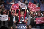 Supporters of Republican presidential candidate Donald Trump cheer during a campaign rally, Oct. 13, 2016, Cincinnati, Oh. (AP photo by John Minchillo).