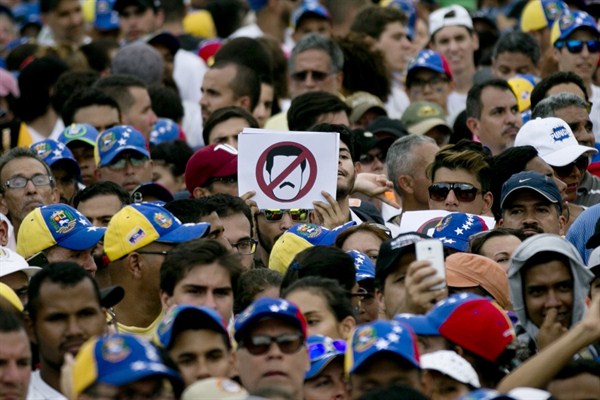A protest against Venezuelan President Nicolas Maduro, Caracas, Oct. 26, 2016 (AP photo by Ariana Cubillos).