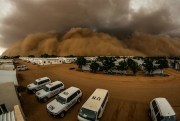 A sand storm over the African Union-United Nations Mission in Darfur (UNAMID) headquarters, El Fasher, North Darfur, Aug. 8, 2015 (UNAMID photo by Adrian Dragnea).