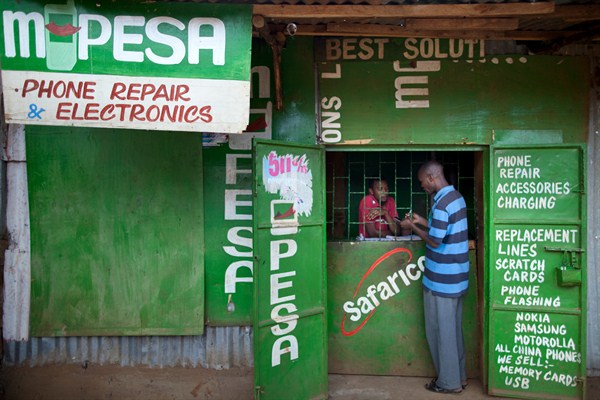 A service outlet for M-Pesa, the mobile-phone based money transfer and micro-financing service, in Gatina slum, Nairobi, Kenya, Dec. 16 2012 (Sipa photo by Benedicte Desrus).