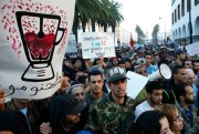 With graphic posters and signs, thousands of Moroccans protest against the death of Mouhcine Fikri, Rabat, Morocco, Oct. 30, 2016 (AP photo by Abdeljalil Bounhar).