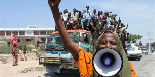 A woman shouts slogan during an electoral rally, Mogadishu, Somalia, Aug. 9, 2012 (AP photo by Farah Abdi Warsameh).