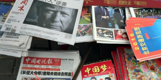 A Chinese newspaper on a newstand with a photo of U.S. President-elect Donald Trump and the headline “Outsider counter attack,” Beijing, Nov. 10, 2016 (AP photo by Ng Han Guan).