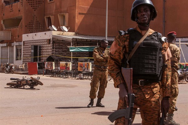 Troops provide security after militants led an attack on a hotel and a cafe popular with foreigners, Ouagadougou, Burkina Faso, Jan. 18, 2016 (AP photo by Theo Renaut).
