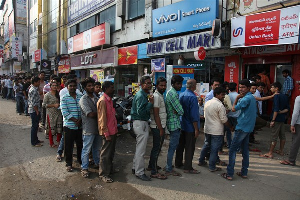 Indians stand in line to withdraw money from an ATM, Hyderabad, India, Nov. 19, 2016 (AP photo by Mahesh Kumar A.).
