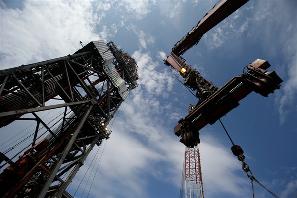 A crane rises next to the main tower of the Centenario deepwater drilling platform in the Gulf of Mexico, off the coast of Veracruz, Mexico, Nov. 22, 2013 (AP photo by Dario Lopez-Mills).
