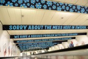 Posters by the anti-immigrant Sweden Democrats hang in a subway station, Stockholm, Sweden, Aug. 3, 2015 (AP photo by Bertil Ericson).