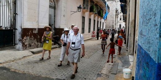 U.S. tourists walk outside the Bodeguita del Medio Bar, Havana, Cuba, May 24, 2015 (AP photo by Desmond Boylan).