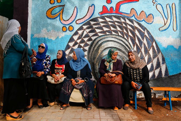 Egyptian women wait to cast their votes during parliamentary elections, Alexandria, Egypt, Oct. 19, 2015 (AP photo by Hassan Ammar).
