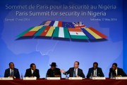 French President Francois Hollande speaks alongside leaders and officials from Africa at the Paris Summit for security in Nigeria, Paris, May 17, 2014 (AP photo by Francois Mori).