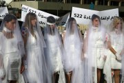 Lebanese women protest a law that allows a rapist to get away with his crime if he marries the survivor, Beirut, Lebanon, Dec. 6, 2016 (AP photo by Bilal Hussein).