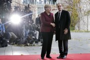French President Francois Hollande and German Chancellor Angela Merkel, Berlin, Germany, Nov. 18, 2016 (AP photo by Markus Schreiber).