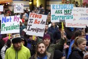 A protest against President Donald Trump's travel ban on refugees and citizens of seven Muslim-majority nations, Seattle, Wa., Jan. 29, 2017 (AP photo by Elaine Thompson).