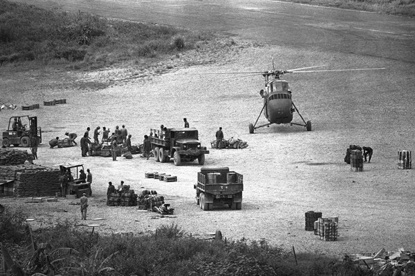 Trucks laden with troops and ammunition await helicopter transportation in Long Tieng, a staging area for the CIA-backed clandestine army of Hmong tribesmen, Laos, Oct. 3, 1972 (AP photo).