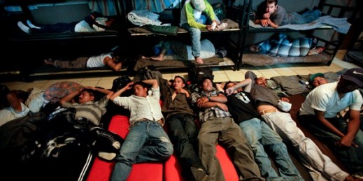 Men look for a place to sleep in a crowded shelter for migrants deported from the United States, Nogales, Mexico. April 28, 2010 (AP photo by Gregory Bull).