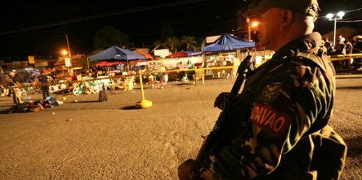 A Philippine soldier guards the site of bombing at a night market that killed 15 people, Davao city, southern Philippines, Sept. 2, 2016 (AP photo by Manman Dejeto).