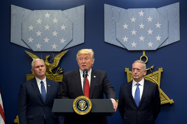 U.S. President Donald Trump, flanked by Vice President Mike Pence and Defense Secretary James Mattis, speaks during an event at the Pentagon, Washington D.C., Jan. 27, 2017 (AP photo by Susan Walsh).