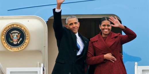Former U.S. President Barack Obama and first lady Michelle Obama as they board Air Force One, Maryland, Jan. 20, 2017 (AP photo by Steve Helber).