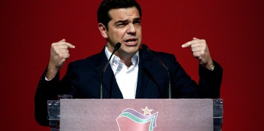 Greek Prime Minister Alexis Tsipras speaks to supporters of his Syriza party on the first anniversary of its general election victory, Athens, Jan. 24, 2016 (AP photo by Yorgos Karahalis).
