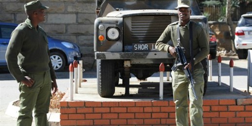 Army personnel outside the military headquarters in Maseru, Lesotho, after the country's prime minister fled to South Africa after what he called an attempted coup, Aug. 31, 2014 (AP photo).