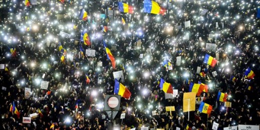 Tens of thousands of people shine lights from mobile phones and torches during a protest in front of the government building, Bucharest, Romania, Feb. 5, 2017 (AP photo by Andreea Alexandru).