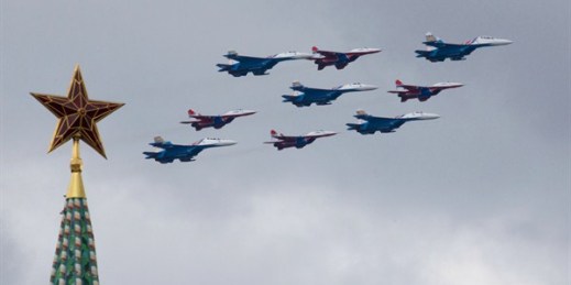 Russian Air Force aerobatic teams in MiG-29 and Su-27 fighter jets fly over the Kremlin during a rehearsal for the Victory Day military parade, Moscow, May 5, 2016 (AP photo by Ivan Sekretarev).
