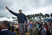 Rwanda's president, Paul Kagame, waves to the crowd before speaking at a ceremony, Kinigi, Rwanda, Sept. 5, 2015 (AP photo by Ben Curtis).