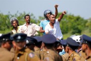 A protest in the village of Mirijjawila against a planned Chinese deal to purchase private land for an industrial zone near the Hambantota port, Ambalantota, Sri Lanka, Jan. 7, 2017 (AP photo by Eranga Jayawardena).