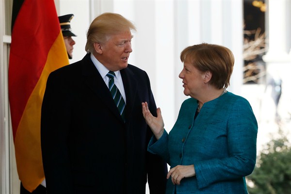 President Donald Trump greets Germany's chancellor, Angela Merkel, outside the West Wing of the White House in Washington, March 17, 2017 (AP photo by Pablo Martinez Monsivais).