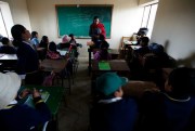 A teacher leading class at the Chanocawa Catholic school, El Alto, Bolivia, March 5, 2012 (AP photo by Juan Karita).