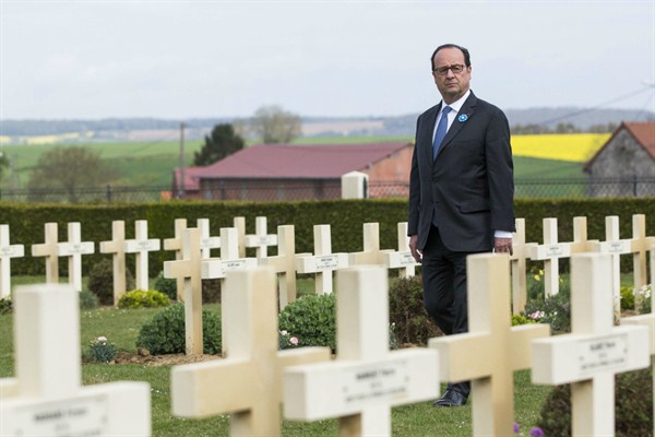 French President Francois Hollande walks in the Cerny cemetery during a ceremony marking the 100th anniversary of the Chemin des Dames battle, Cerny-en-Laonnois, France, April 16, 2017 (Sipa via AP Images).
