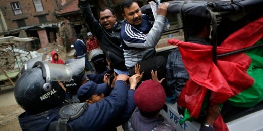 Nepalese policemen detain activists of the United Democratic Madhesi Front during a general strike to protest the killing of four Mahdesi protesters, Kathmandu, Nepal, March 10, 2017 (AP photo by Niranjan Shrestha).