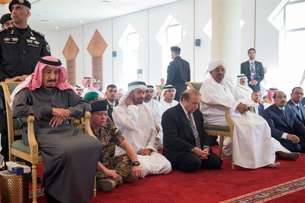 King Salman of Saudi Arabia and Sudan's president, Omar al-Bashir, seated, attend a prayer with regional leaders, Hafr al-Batin, Saudi Arabia, March 11, 2016 (Sipa photo via AP Images).