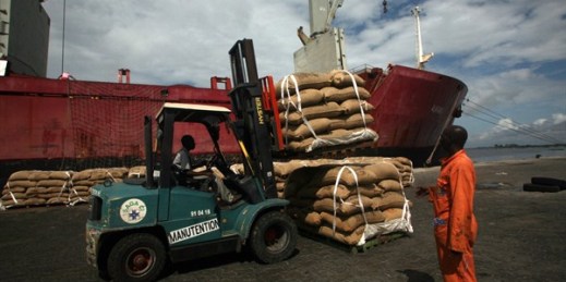 Workers load cocoa beans for shipment, Abidjan, Ivory Coast, May 10, 2011 (AP photo by Emanuel Ekra).