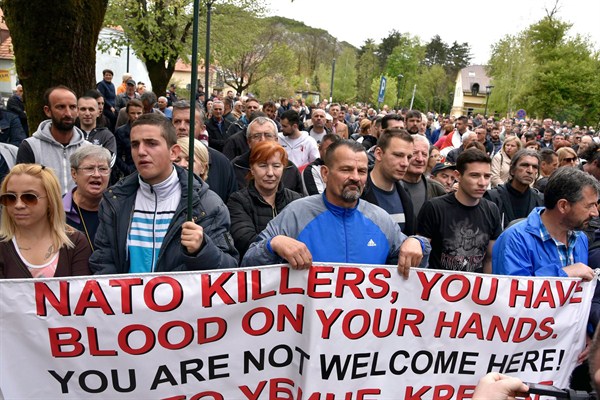 Anti-NATO demonstrators protest outside Montenegro's parliament during the vote to ratify membership, Cetinje, Montenegro, April 28, 2017 (AP photo by Risto Bozovic).
