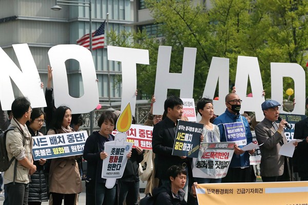 South Koreans hold cardboard letters reading "NO THAAD" during a rally near the U.S. Embassy, Seoul, South Korea, April 28, 2017 (AP photo by Lee Jin-man).