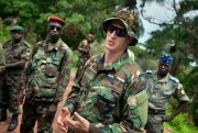 A U.S. Army Special Forces captain speaks with troops from the Central African Republic and Uganda searching for warlord Joseph Kony, Obo, Central African Republic, April 29, 2012 (AP photo by Ben Curtis).