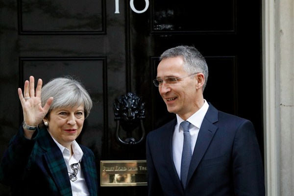 British Prime Minister Theresa May welcomes NATO Secretary General Jens Stoltenberg at 10 Downing Street, London, May 10, 2017 (AP photo by Frank Augstein).