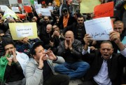 Teachers, health workers and civil servants join a three-day strike over plans to tighten spending and increase the retirement age, Algiers, Nov. 21, 2016 (AP photo by Sidali Djarboub).