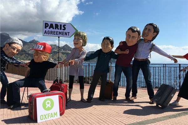Oxfam activists wearing masks of the leaders of the G7 summit, Sicily, Italy, May 26, 2017 (AP photo by Paolo Santalucia).