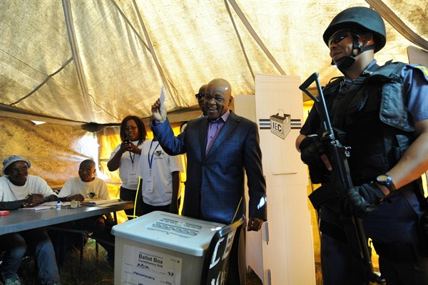 Lesotho’s former prime minister, Thomas Thabane, casts his vote during a previous election, Maseru, Lesotho, Feb. 28, 2015 (AP photo).