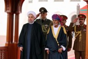 Iranian President Hassan Rouhani, left, is welcomed by Omani Sultan Qaboos at the start of his visit, Muscat, Oman, Feb. 15, 2017 (Iranian Presidency Office photo via AP).