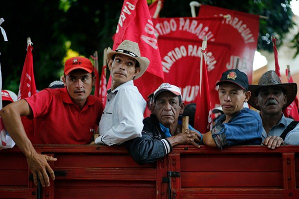 Agricultural workers arrive to participate in an annual march organized by the National Farmers’ Federation, Asuncion, Paraguay, March 17, 2016 (AP photo by Jorge Saenz).