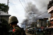 Smoke rises following airstrikes by the Philippine Air Force at militant positions in the besieged city of Marawi, southern Philippines, June 6, 2017 (Sipa photo by Richard Atrero de Guzman via AP).